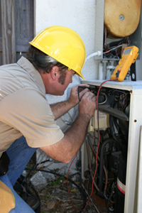  An Omaha AC technician installing an AC system